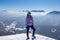 Freiberg - Woman enjoying panoramic view from summit Freiberg of Karawanks, Julian Alps, in Carinthia, Austria. Snow shoe