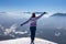 Freiberg - Woman enjoying panoramic view from summit Freiberg of Karawanks, Julian Alps, in Carinthia, Austria. Snow shoe