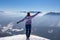 Freiberg - Woman enjoying panoramic view from summit Freiberg of Karawanks, Julian Alps, in Carinthia, Austria. Snow shoe