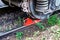 Freight car is secured with red brake shoe