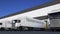 Freight semi truck with TRANSPORTATION caption on the trailer loading or unloading. Road cargo transportation 3D