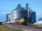 Freight train being loaded with grain for transport