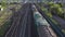 Freight train carries cargo. View of the train from above. Rail transport for intercity trade.