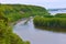 Freight train heading up along the mississippi river