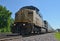 Freight train locomotive pulling car transports