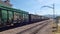 Freight train with a locomotive from the Renfe company at the head and dragging wagons