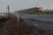 Freight train locomotives in rain in California Great Central Valley