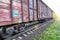 Freight train, railway wagons with motion blur effect. Transportation, railroad.