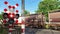 Freight train slowly passing railroad crossing with blinking red lights