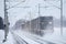 Freight train on snowy railroad track