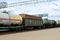 Freight train, transporting of wagons with wood andtank car LNG by, natural gas, crude oil and ethanol