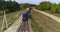 Freight train transports containers view from the drone, transportation of cargo by train, transportation of containers