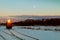 Freight train travels through the vast expanses of snow-covered