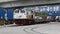 Freight train and trucks assemble in container dry port