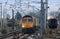 Freight trains and steam train, WCML, Carnforth