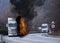 Freight transport truck in flames. The truck is burning on the street. Danger of explosion