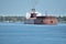 Freighter Heads Down River During Early Fall