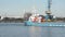 Freighter passing along a dock in the harbor of Ghent