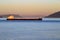 Freighter Ship in Rosario Strait at Sunset, Saturna Island, British Columbia, Canada