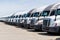 Freightliner Semi Tractor Trailer Trucks Lined up for Sale. Freightliner is owned by Daimler AG III