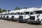 Freightliner and Volvo Semi Tractor Trailer Trucks Lined up for Sale. Freightliner is owned by Daimler