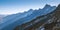 French Alps mountains wide angle landscape panoramic view with a Aiguille du Midi 3842m nature landmark peak during the Mont Blanc