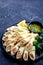 French appetizer: crepes with cheese and salmon