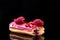 French Artisan Eclair on Black Reflective Background,Copy Space