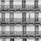 French balconies with decorative railings and tall windows