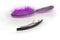 French barrette hair clip on a blurred background of hairbrush