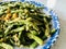 French Beans and Salted Duck Egg Yolks. Close up view.