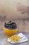 French blue mussel with herbs in a yellow bowl with french fries glass ramekin on napkin Seafood in a wooden board in