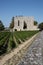 French bordeaux vineyards and ruins of an ancient convent in Saint Emilion France