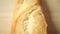 French bread baguette vertical close up dolly shot