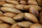 French bread baguettes from bakery. Selective focus. Fresh bred and baguettes background