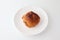 French bread pain au chocolat chocolate croissant on plate on white background