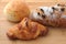 French bread with raisin croissant isolated on cutting board