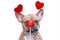 French Bulldog dog wearing Valentine headband with hearts looking at red kiss lips photo prop in front of face on white background