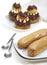 FRENCH CAKES CALLED CHOCOLATE RELIGIEUSE AND COFFE ECLAIR
