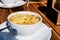 French caramelized onion soup with croutons and gruyere cheesse from oven