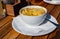 French caramelized onion soup with croutons and gruyere cheesse from oven