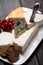 French cheeses plate in assortment, blue cheese, brie, munster,