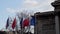 French and Chinese flags in the wind in front of National Assembly