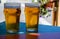 French cold beer in misted glasses served on outdoor terrace in small Alpine village in France