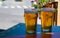 French cold beer in misted glasses served on outdoor terrace in small Alpine village in France