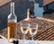 French cold rose dry wine from Provence s in sunny day with view on old roofs of Arles town in sunny day