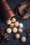 French colorful macaroons. Cappuccino, chocolate and nut taste. Restaurant or cafe atmosphere. Retro. Vintage