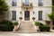 french country house exterior with majestic staircase leading to front door