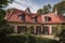 french country house roof with bold red tile roof and dormer windows