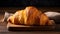 French Croissant, Freshly Baked with Glistening Flaky Layers Delectable Croissant Photo